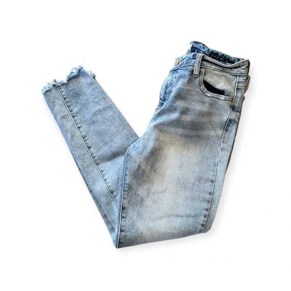 Cello trendy light blue jeans distressed hem  junior size 3